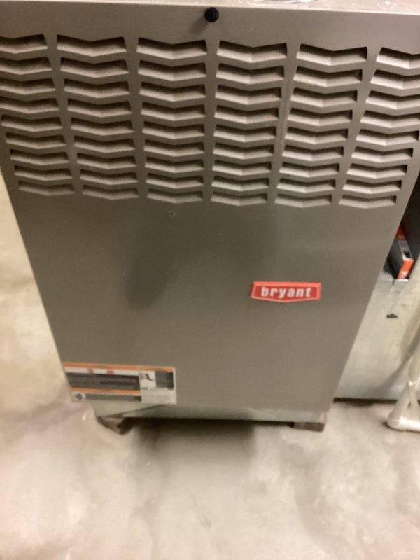 Completed full system replacement estimate for residential HVAC installation. Assessed existing Bryant furnace/air handler unit located in basement utility area, documenting current equipment condition including ductwork configuration, PVC drainage lines, copper refrigerant lines, and electrical conduit routing. Provided comprehensive quote for complete system replacement including both heating and cooling components with estimated installation timeline of 2-4 days.
