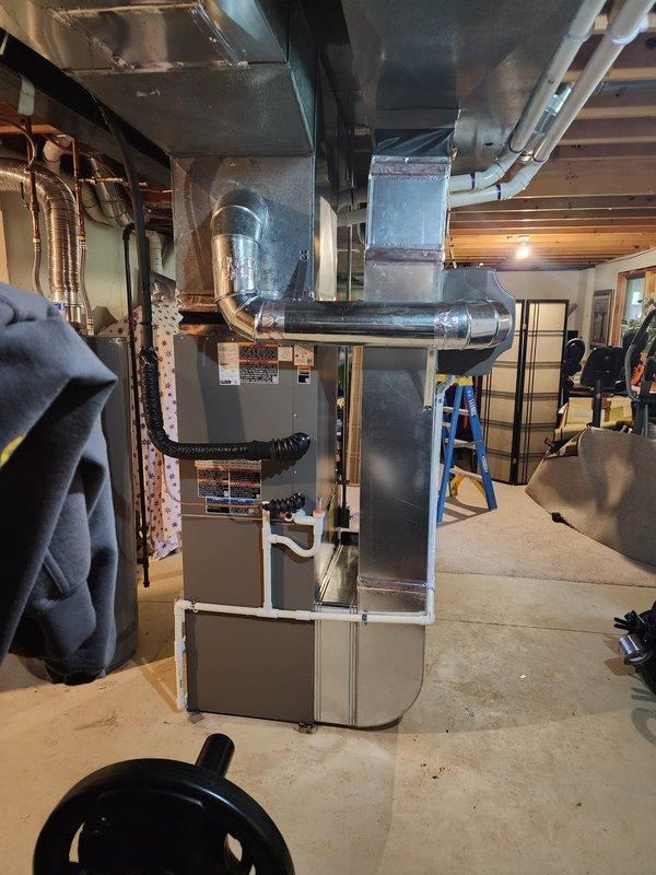 Returned to complete punch list items on previous day's Lennox HVAC system installation including furnace, air conditioner, humidifier, and S40 thermostat. Verified proper leveling of equipment and ductwork connections, tightened all mechanical fasteners, and inspected refrigerant line insulation and copper piping runs. Confirmed all components are properly secured, level, and operational per manufacturer specifications.