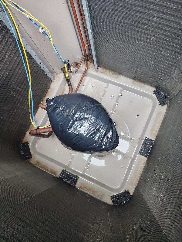 Completed comprehensive AC Maintenance 3-5 service on residential split system. Inspected outdoor condenser unit, verified proper operation and airflow through coil, and examined indoor evaporator coil assembly with condensate drain pan for proper drainage and system integrity.