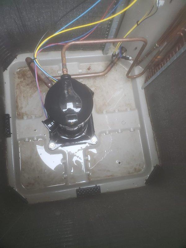 Completed routine preventive maintenance on a 4-year-old residential air conditioning system under the Worry Free Service Agreement. Performed comprehensive AC tune-up on the outdoor condensing unit, which included inspection of the compressor, condenser coil, fan motor assembly, and refrigerant lines. Verified proper operation of all electrical components and connections. Inspected the indoor air handler and condensate management system located in the attic space, including the drain pan, condensate pump with associated wiring, and copper refrigerant line connections. Noted existing water staining on drain pan consistent with normal condensate drainage patterns. Confirmed condensate removal system functioning properly with no active leaks or blockages observed. Checked refrigerant line insulation and connections at both indoor and outdoor units. Outdoor unit positioned on composite pad with adequate clearance and airflow around condenser coil. All system components operating within no
