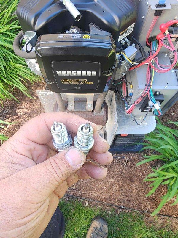 Performed routine maintenance on Vanguard 627cc generator unit, including removal and replacement of spark plugs showing normal wear patterns. Inspected electrical connections, control panel wiring, and engine components to ensure proper operation. Coordinated generator service with scheduled AC maintenance for efficient completion of both systems during the same service visit.