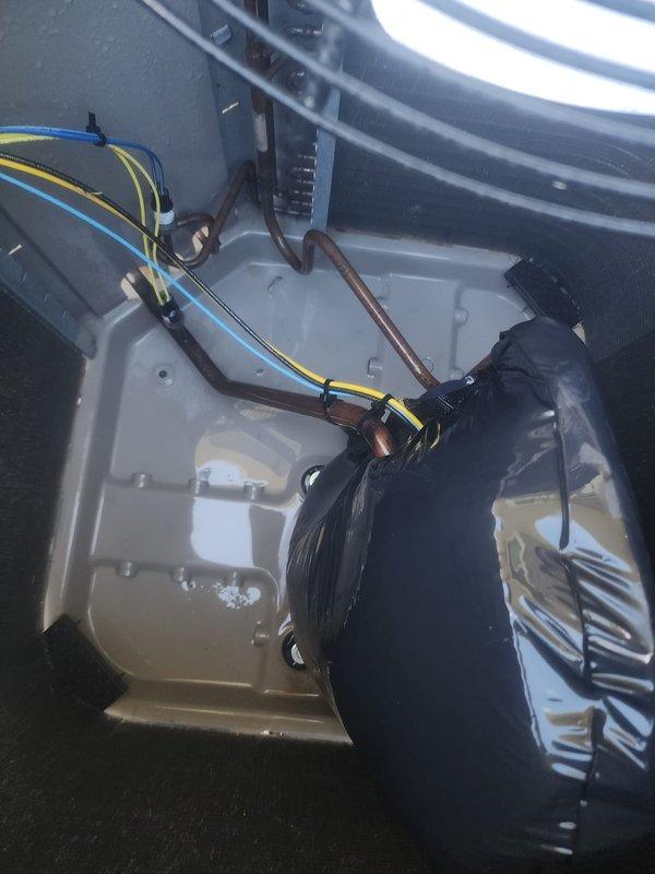 Completed scheduled cooling system maintenance on residential air conditioning unit. Performed comprehensive system inspection including refrigerant line evaluation, electrical connections check, and condenser unit assessment. All components found operating within normal parameters, copper refrigerant lines and service valves inspected and confirmed secure, and internal wiring connections verified tight with proper insulation intact.