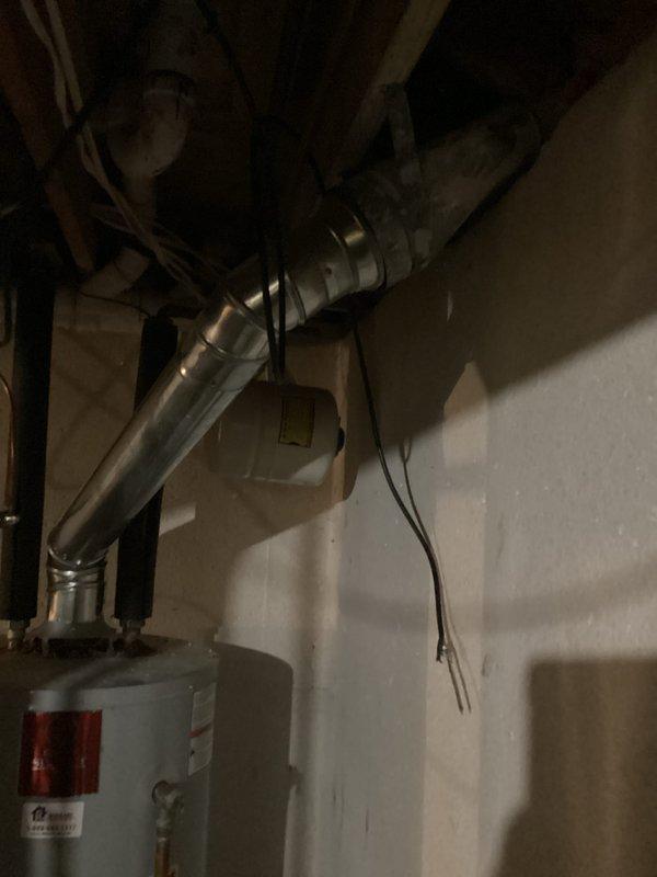 Conducted site assessment and provided estimate for upgrading existing conventional tank-style water heater to tankless system. Evaluated current installation including gas supply lines, copper piping connections, electrical requirements, and venting infrastructure. Documented existing equipment specifications and utility room configuration to determine necessary modifications for tankless conversion, including potential adjustments to gas line sizing, electrical service, and exhaust venting requirements.