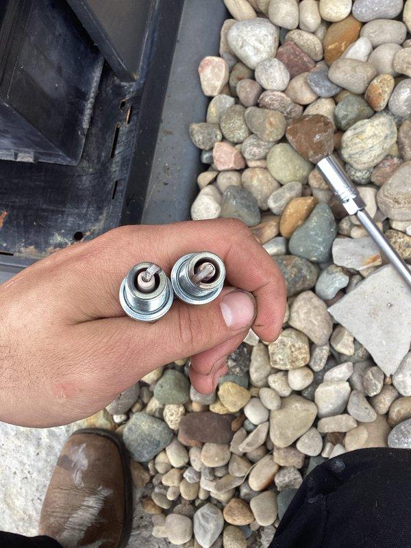 Performed scheduled maintenance on residential standby generator system. Replaced two corroded chrome-plated spring-loaded fasteners that secure critical components to the unit housing. Addressed significant rust and corrosion on cylindrical exhaust component, which showed heavy oxidation and deterioration affecting system integrity. Inspected electrical disconnect box, verified wire connections, and confirmed proper operation of all mechanical systems. Cleaned debris from unit base and surrounding area to ensure adequate ventilation and prevent future corrosion issues.