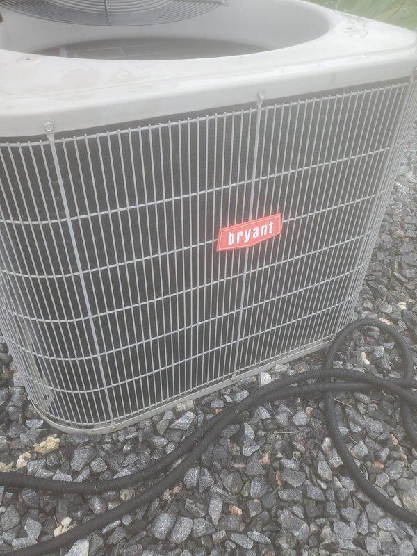 Completed comprehensive cooling season maintenance on Bryant residential air conditioning system. Performed complete tune-up including inspection of outdoor condenser unit, cleaned condenser coils, verified proper operation of condenser fan motor and compressor, checked refrigerant levels and pressures, inspected electrical connections and capacitors, and tested condensate drain system functionality. System operating within manufacturer specifications with no deficiencies noted.