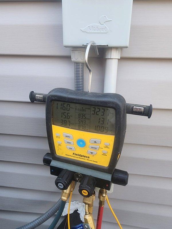 Responded to no-cooling complaint on 8-year-old air conditioning system running continuously with indoor temperature at 81°F despite thermostat set to 76°F. Upon arrival, performed comprehensive system diagnostics using digital manifold gauge set to measure operating pressures and temperatures. Inspection revealed low refrigerant charge indicated by abnormal suction and discharge pressures and temperatures. Conducted leak detection procedures and identified refrigerant leak in system. Recovered remaining refrigerant per EPA regulations, repaired leak, evacuated system to remove moisture and non-condensables, and recharged unit to manufacturer specifications using appropriate refrigerant type. Verified proper superheat and subcooling values post-repair. Confirmed condenser fan motor operation, inspected condenser coils for cleanliness and airflow obstruction, and verified all electrical connections secure. System tested and operational with proper cooling capacity restored, achieving ta