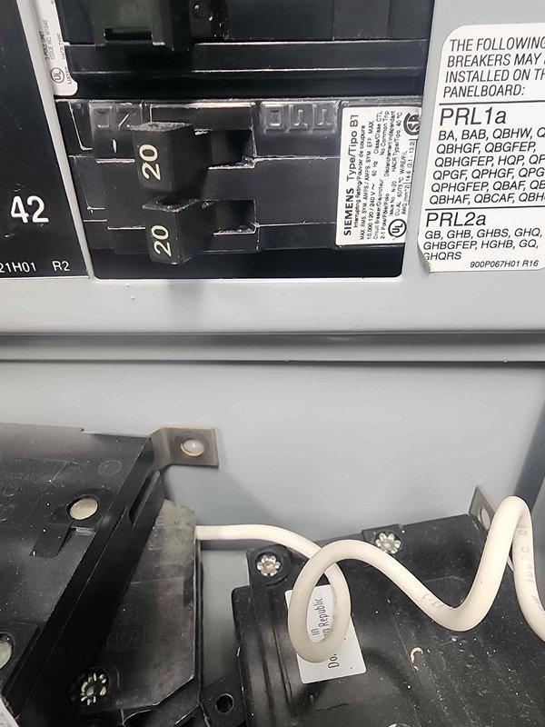 Completed electrical service request for junction box installation at restaurant back door location. Assessed existing electrical infrastructure including Siemens breaker panel with 20-amp circuits and Hatco Corporation food warming equipment unit (Model TFWM36-3900) requiring proper electrical supply. Installed single-pole to three-pole junction box configuration as specified to provide safe and code-compliant power distribution. Verified adequate clearances and non-combustible surroundings per manufacturer specifications and NEC requirements. All connections properly secured and tested for functionality.