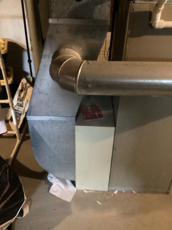 Responded to service call for air conditioner that would not start. Conducted comprehensive system evaluation of existing HVAC installation in basement utility area. Assessed furnace, ductwork connections, and associated components including water heater and humidifier systems. Documented current equipment configuration with photographic evidence showing galvanized metal ductwork, PVC piping connections, and overall system layout. Prepared full system and single component replacement estimate options for customer consideration.