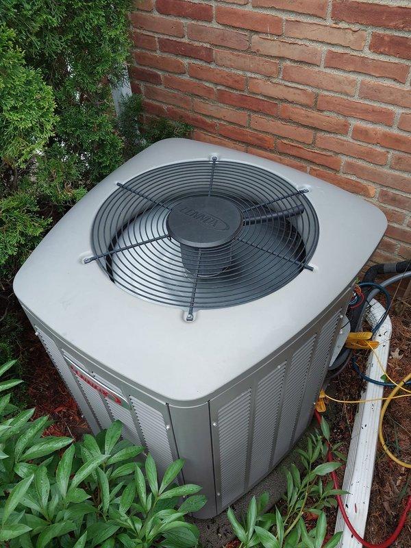 Completed preventive maintenance service on residential outdoor condensing unit as part of Worry Free Service Agreement cooling season inspection. Performed comprehensive system evaluation including visual inspection of unit exterior, fan guard, cabinet louvers, and refrigerant line connections; all components found in normal operating condition with no visible damage or excessive wear noted. Unit properly positioned on mulch base against building foundation with adequate clearance for airflow and future service access.