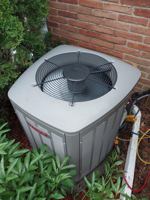 Completed preventive maintenance service on residential outdoor condensing unit as part of Worry Free Service Agreement cooling season inspection. Performed comprehensive system evaluation including visual inspection of unit exterior, fan guard, cabinet louvers, and refrigerant line connections; all components found in normal operating condition with no visible damage or excessive wear noted. Unit properly positioned on mulch base against building foundation with adequate clearance for airflow and future service access.