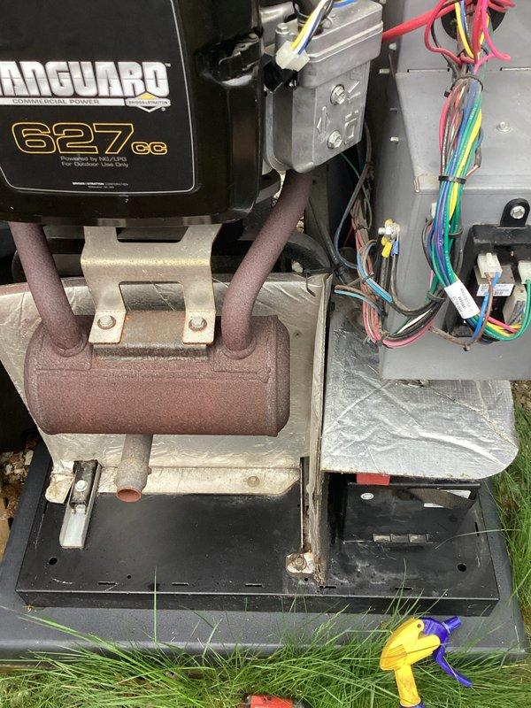 Performed scheduled preventive maintenance on Vanguard 627cc generator system. Inspected internal components, electrical control panel, and wiring harness connections. Removed and replaced spark plugs as part of routine maintenance protocol. Verified all mounting hardware, examined exhaust manifold assembly, and confirmed proper operation of electrical junction box and color-coded wire connections. Unit tested and returned to service in optimal working condition.