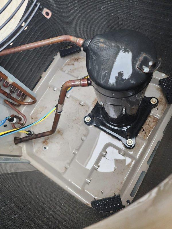 Completed comprehensive AC tune-up on outdoor condensing unit during evening service window. Performed full system inspection including compressor operation, refrigerant line connections, electrical wiring integrity, and condenser coil condition. All components found operating within normal parameters with coil fins clean and properly aligned, copper refrigerant lines secure, and compressor functioning correctly.