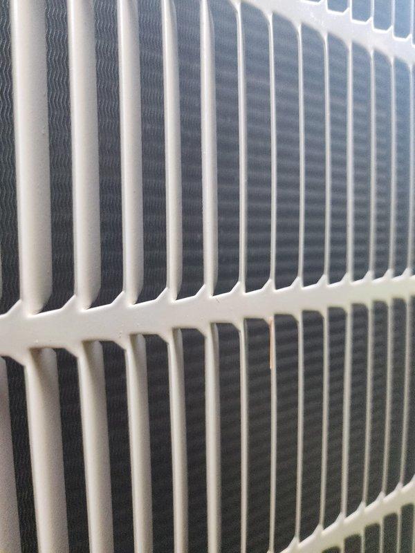Completed comprehensive AC tune-up on outdoor condensing unit during evening service window. Performed full system inspection including compressor operation, refrigerant line connections, electrical wiring integrity, and condenser coil condition. All components found operating within normal parameters with coil fins clean and properly aligned, copper refrigerant lines secure, and compressor functioning correctly.
