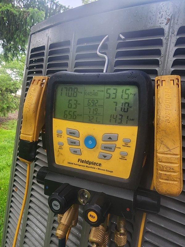 Responded to no cooling call on recently installed system. Upon arrival, connected manifold gauges to check refrigerant pressures and temperatures. System diagnostics revealed abnormal operating pressures and temperatures across suction and discharge lines. Performed comprehensive system evaluation using digital manifold to assess refrigerant charge, superheat, and subcooling values. Identified and corrected refrigerant charge issue, bringing system parameters within manufacturer specifications. Verified proper system operation with all readings stabilized in normal range before departure.