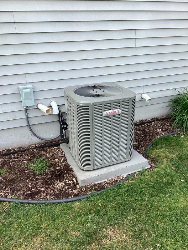 Completed comprehensive HVAC replacement estimate for residential system including outdoor condensing unit positioned on concrete pad with proper electrical disconnect and indoor furnace with evaporator coil assembly connected to existing ductwork in basement. Documented current equipment configuration, electrical connections, refrigerant line routing, and condensate drainage system to provide detailed replacement specifications for complete system upgrade.