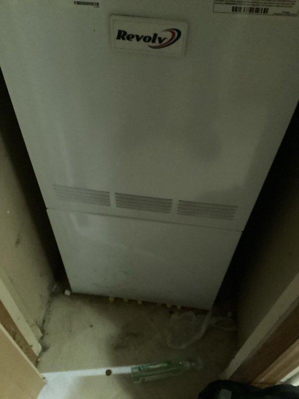 Provided estimate for complete air conditioning system replacement for non-operational unit approximately 20 years old. Assessed existing Revoly equipment installed in interior closet location with wall-mounted return air grille. Evaluated system configuration and presented replacement options to restore residential cooling capacity.