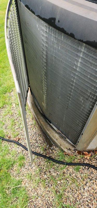 Completed comprehensive AC tune-up on 10-year-old air conditioning system. Performed standard maintenance inspection including examination of condenser unit, refrigerant lines, electrical connections, and compressor components. Documented existing base plate corrosion and overall unit condition with photos; system operational with no immediate service issues identified at time of visit.