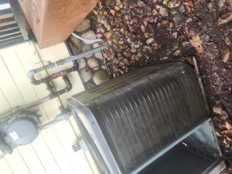 Completed scheduled maintenance on two residential HVAC systems. Performed comprehensive inspection of both outdoor condensing units, including compressor operation verification, refrigerant line assessment, and evaporator coil examination. Noted age-related wear on equipment components with surface oxidation on copper lines and weathering on compressor housings. Cleared debris accumulation from around exterior units and verified proper airflow through condenser coils. Both systems operational and functioning within normal parameters upon completion of maintenance service.