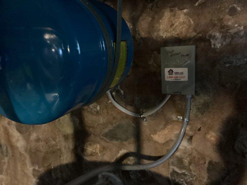 Installed a 50-gallon Bradford White electric water heater in basement utility area. Connected all necessary copper supply lines, PVC discharge piping, pressure relief valve, and electrical wiring to existing circuits. Verified proper operation of expansion tank and all safety components upon system startup.
