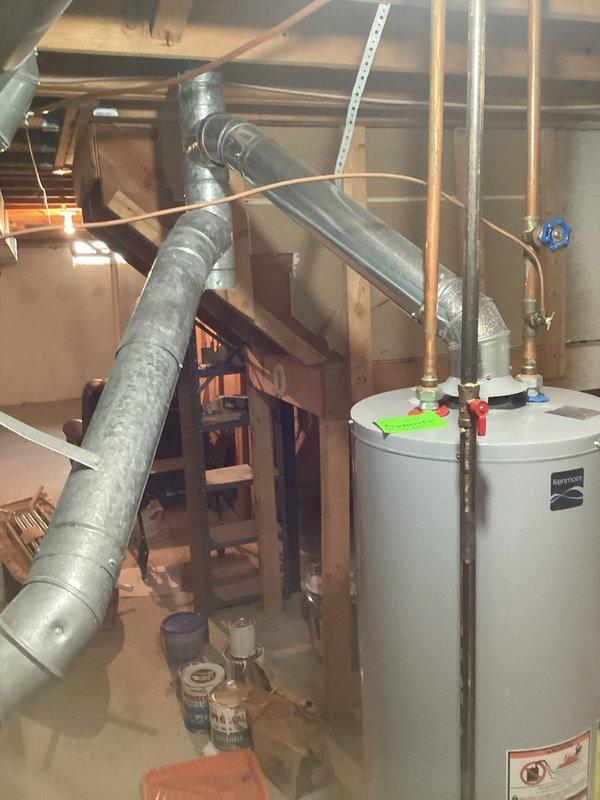 Provided comprehensive estimate for full HVAC system replacement at condo property with 30-year-old equipment currently located in basement and exterior areas. Existing natural gas furnace and associated components assessed for complete system upgrade, with all equipment operational at time of evaluation. Documented electrical service panel configuration and existing mechanical infrastructure including ductwork, water heater proximity, and available utility connections to ensure proper specifications for new equipment installation.