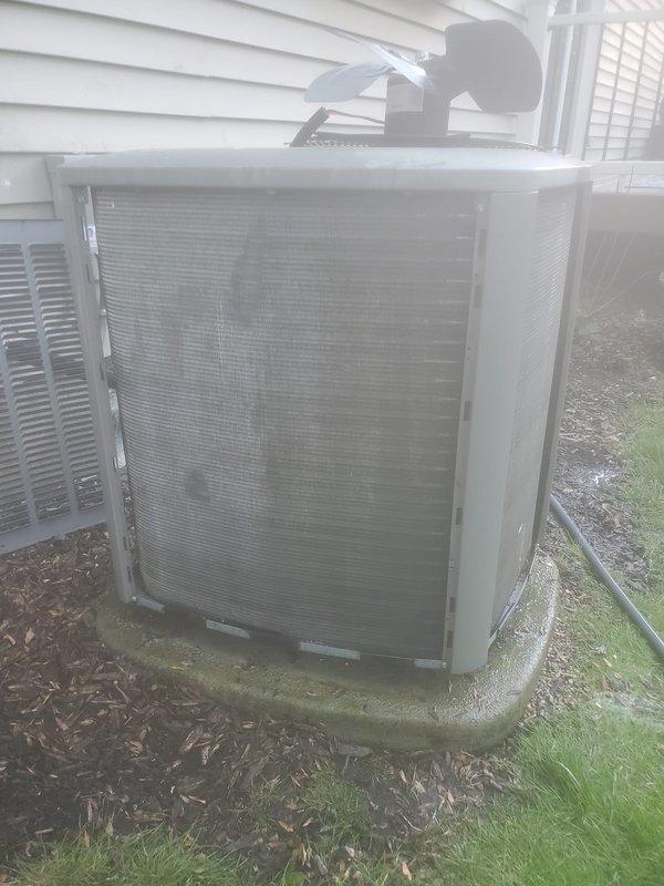 Completed scheduled air conditioning maintenance on residential HVAC system. Performed comprehensive inspection of outdoor condenser unit and indoor air handler components, including compressor, refrigerant lines, electrical connections, and condenser coils. All components found operating within normal parameters with no immediate service needs identified. System documented photographically for maintenance records.