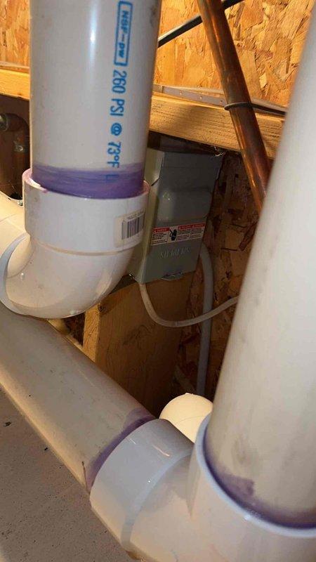 Completed full HVAC system installation including Lennox furnace, air conditioner, S40 thermostat, and power humidifier. Installed two additional return air grilles in basement to improve air circulation and system balance. Addressed code violation by correcting AC disconnect clearance requirements and securing loose connector at furnace switch, ensuring proper electrical safety compliance and system functionality.