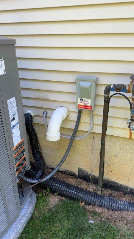 Completed full HVAC system installation including Lennox furnace, air conditioner, S40 thermostat, and power humidifier. Installed two additional return air grilles in basement to improve air circulation and system balance. Addressed code violation by correcting AC disconnect clearance requirements and securing loose connector at furnace switch, ensuring proper electrical safety compliance and system functionality.
