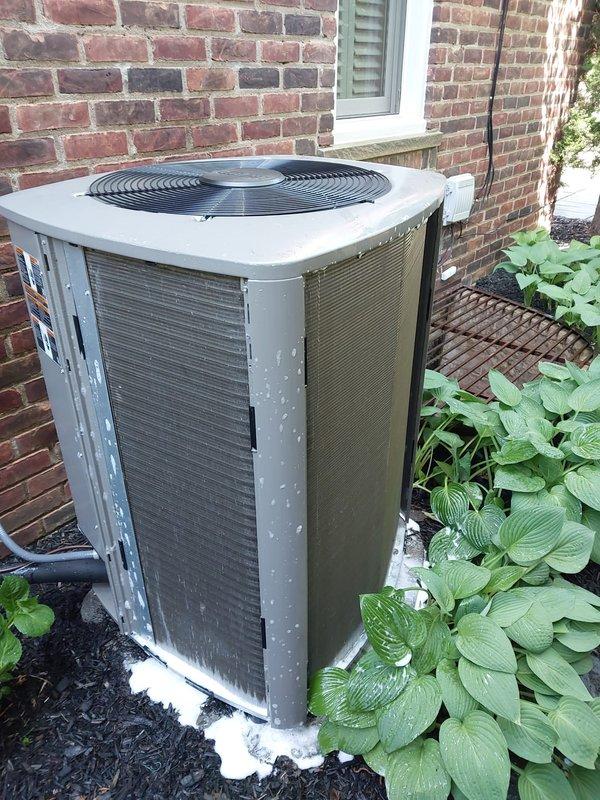 Completed scheduled preventative maintenance on residential split-system air conditioning unit. Performed comprehensive 10-12 point inspection of outdoor condenser unit, verified proper operation of all components, and documented equipment condition with photographic records. Unit found in satisfactory working condition with adequate clearance from surrounding landscaping.