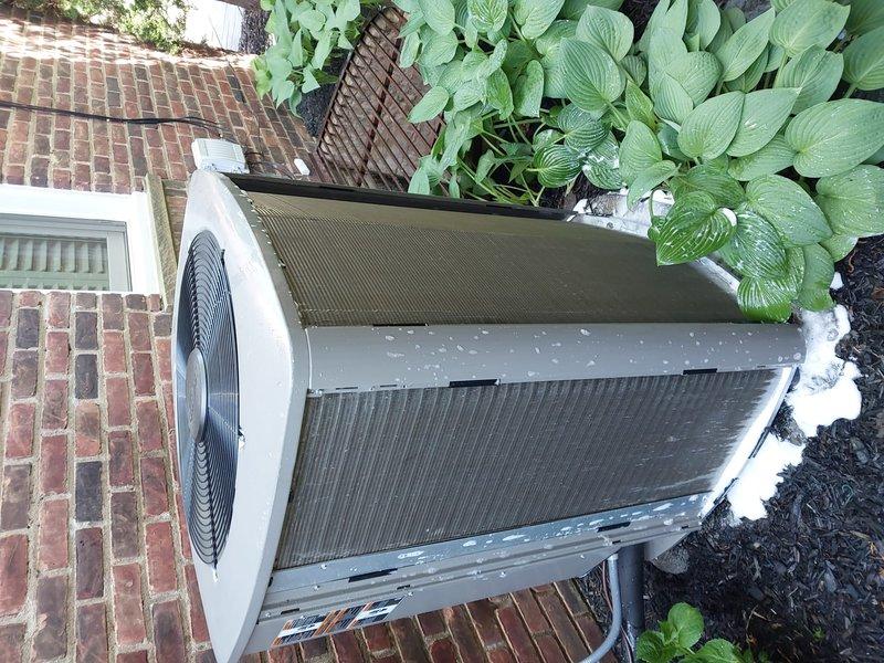 Completed scheduled preventative maintenance on residential split-system air conditioning unit. Performed comprehensive 10-12 point inspection of outdoor condenser unit, verified proper operation of all components, and documented equipment condition with photographic records. Unit found in satisfactory working condition with adequate clearance from surrounding landscaping.