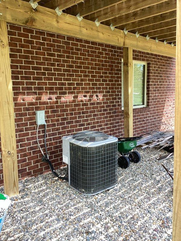 Performed estimate for complete HVAC system replacement on residential property. Existing air conditioning system was found to be completely empty of refrigerant, with history of previous refrigerant recharge including leak sealer application. Evaluated outdoor condenser unit installed under pergola structure on gravel pad with proper electrical disconnect, and inspected indoor air handler/furnace unit in basement with associated ductwork and plenum system. Due to ongoing refrigerant loss and customer's decision not to pursue further repairs on existing equipment, provided comprehensive replacement quote for new system installation.
