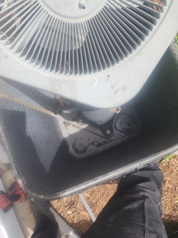 Completed comprehensive cooling system tune-up on operational HVAC unit. Performed standard maintenance protocol including inspection of condenser coil, which showed significant accumulation of dirt, debris, and grime reducing airflow efficiency. Cleaned condenser fins, checked fan operation, verified system performance, and confirmed unit returned to optimal operating condition.