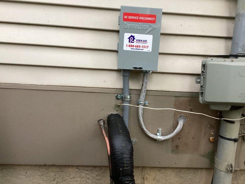 Completed installation of Lennox air conditioning system at residential property. Mounted condenser unit on concrete pad with proper clearances, installed electrical disconnect box with AC service identification, and connected all refrigerant lines with appropriate insulation. All electrical connections were made to existing service panel, system was tested for proper operation, and site was left clean and ready for use.
