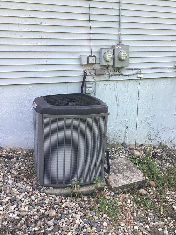 Completed on-site assessment for air conditioning system replacement. Documented existing outdoor condensing unit installation, electrical disconnect configuration, meter connections, and conduit routing to provide accurate estimate for full system replacement.