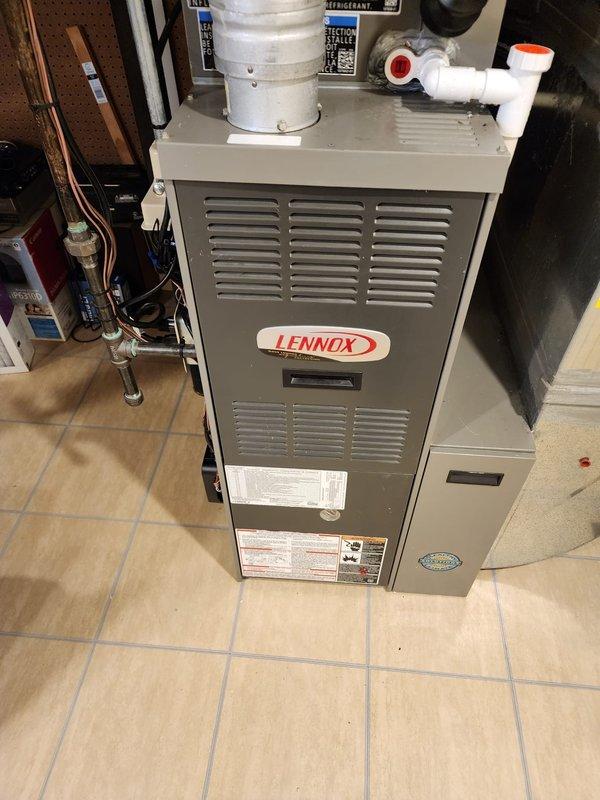 Successfully installed a new Lennox residential air conditioning system, including outdoor condensing unit, indoor air handler, refrigerant line set with proper insulation, and electrical connections. System was tested, charged to manufacturer specifications, and verified to be operating efficiently with proper airflow and temperature differential.