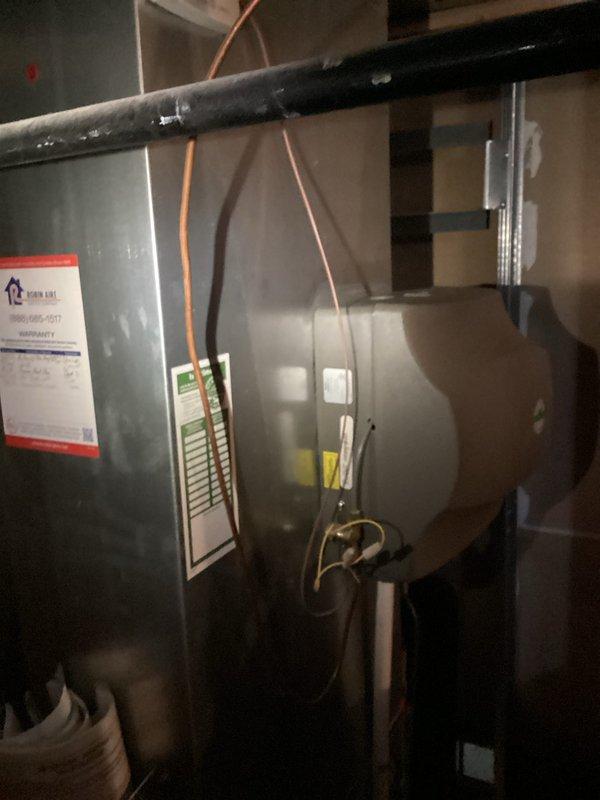 Completed on-site estimate for furnace replacement in residential basement utility area. Evaluated existing HVAC system configuration including furnace unit, refrigerant lines, electrical connections, and associated plumbing components. Documented current equipment specifications, installation conditions, and spatial requirements for replacement unit recommendations.