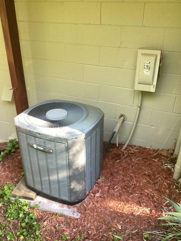 Responded to service call for 22-year-old Trane air conditioning system experiencing freeze-up after approximately 3 hours of runtime. Evaluated outdoor condenser unit and determined probable slow refrigerant leak as cause of icing condition. Due to advanced system age and refrigerant availability concerns, prepared comprehensive estimate for replacement 3.5-ton AC system with indoor blower unit to be installed in garage location with favorable accessibility for equipment changeout.