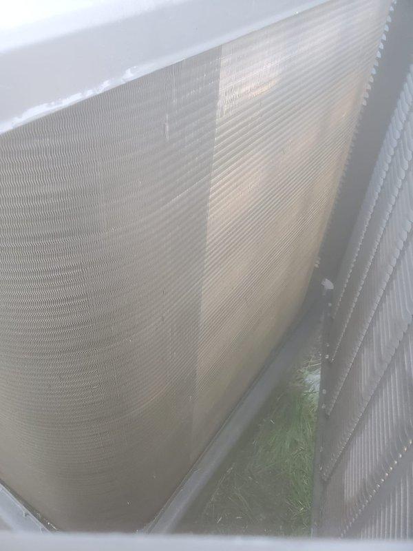 Completed comprehensive preventive maintenance on a 10-year-old outdoor air conditioning unit. Performed full system inspection including visual examination of the condenser coil assembly, which showed moderate accumulation of dirt and debris on the aluminum fins. Inspected compressor, refrigerant lines, and internal components; all copper connections appeared secure with no visible signs of refrigerant leakage. System operational and functioning within normal parameters upon completion of tune-up service.