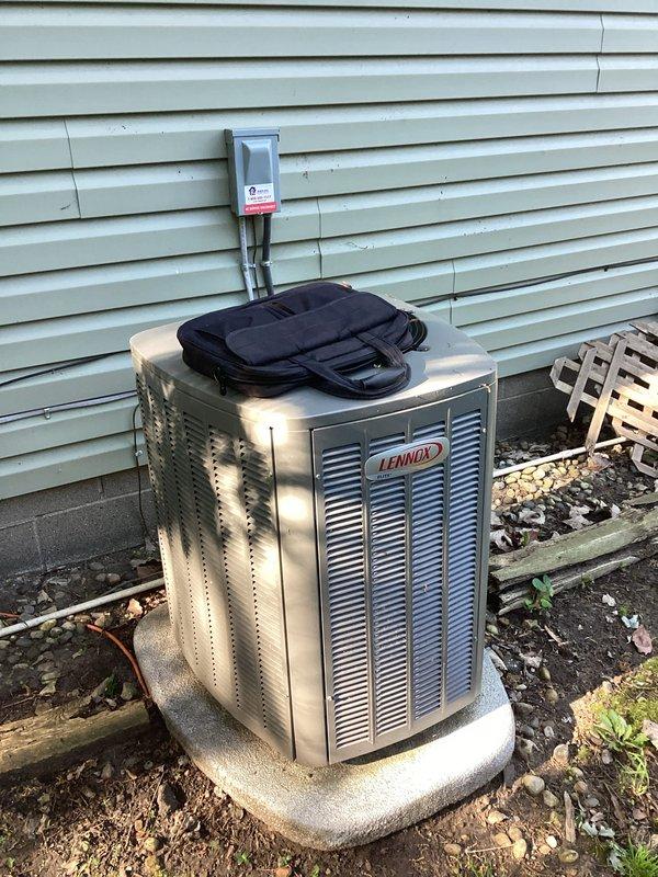 Conducted comprehensive site assessment for standby generator installation at residential property. Evaluated existing electrical panel configuration with dual-column breaker arrangement and documented current circuit distribution for load calculation purposes. Inspected exterior electrical infrastructure including HVAC disconnect and service entrance to determine optimal generator placement and transfer switch integration requirements. Assessed concrete pad location adjacent to existing Lennox HVAC unit for potential generator positioning, considering clearance requirements, fuel line routing, and utility access. Photographed electrical panel circuit mapping and exterior installation area to support equipment sizing recommendations and installation scope development for whole-house backup power system.