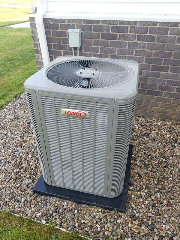 Completed comprehensive cooling system maintenance and tune-up on residential Lennox air conditioning unit. Performed standard preventative maintenance procedures including inspection of condenser unit, verification of proper operation, and system performance evaluation. System is operating properly with no deficiencies noted; unit is properly positioned on pad with adequate drainage and clearance from building structure.