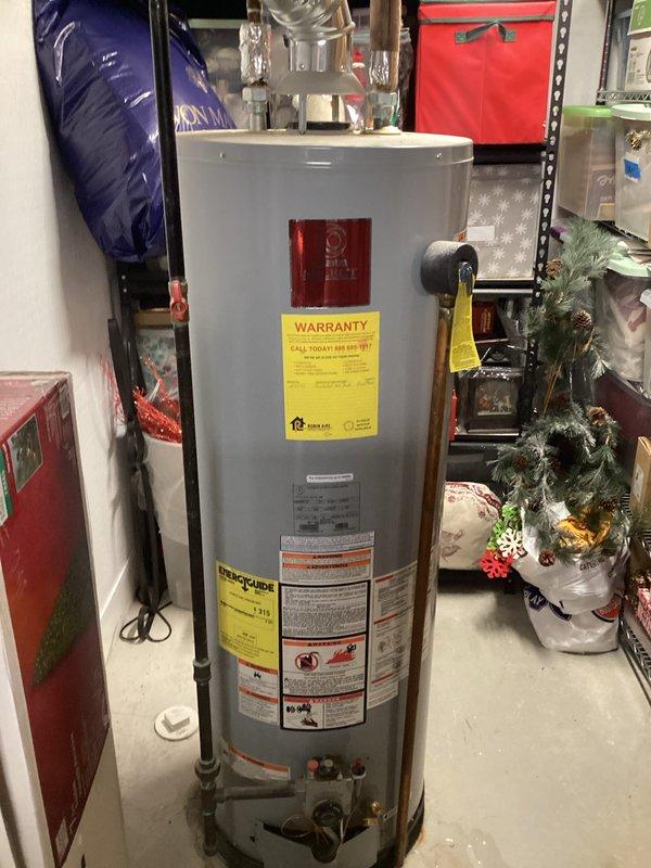 Responded to service call for reported water heater leak in residential utility area. Conducted comprehensive visual inspection of existing gas-fired water heater unit, examining tank exterior, plumbing connections, pressure relief valve, and surrounding piping for signs of active leakage or moisture accumulation. Assessed condition of copper supply lines, shut-off valves, and top-mounted fittings. Evaluated installation environment including clearances, ventilation ductwork proximity, and accessibility for potential replacement. Documented current equipment specifications, manufacturer information, and warranty details visible on unit labels. Photographed water heater installation and surrounding mechanical systems to support estimate preparation. Provided customer with professional assessment and replacement options based on inspection findings.