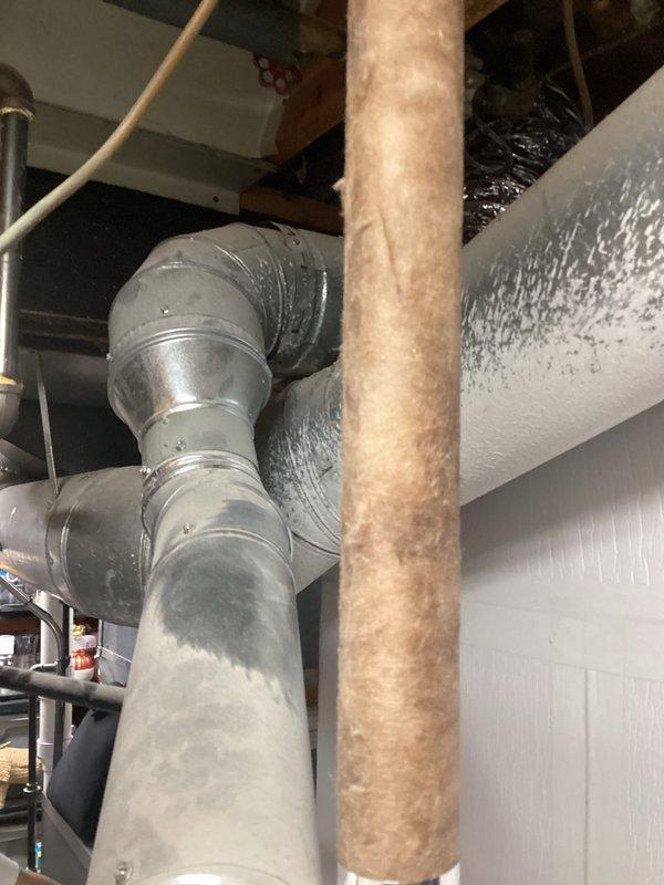 Responded to service call for reported water heater leak in residential utility area. Conducted comprehensive visual inspection of existing gas-fired water heater unit, examining tank exterior, plumbing connections, pressure relief valve, and surrounding piping for signs of active leakage or moisture accumulation. Assessed condition of copper supply lines, shut-off valves, and top-mounted fittings. Evaluated installation environment including clearances, ventilation ductwork proximity, and accessibility for potential replacement. Documented current equipment specifications, manufacturer information, and warranty details visible on unit labels. Photographed water heater installation and surrounding mechanical systems to support estimate preparation. Provided customer with professional assessment and replacement options based on inspection findings.