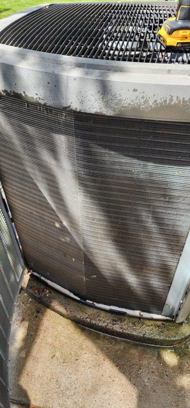 Completed comprehensive cooling system maintenance and tune-up on properly functioning HVAC unit. Performed thorough cleaning of outdoor condenser coils, inspected mechanical room components including copper refrigerant lines and circulation pump, and verified all system operations within normal parameters.
