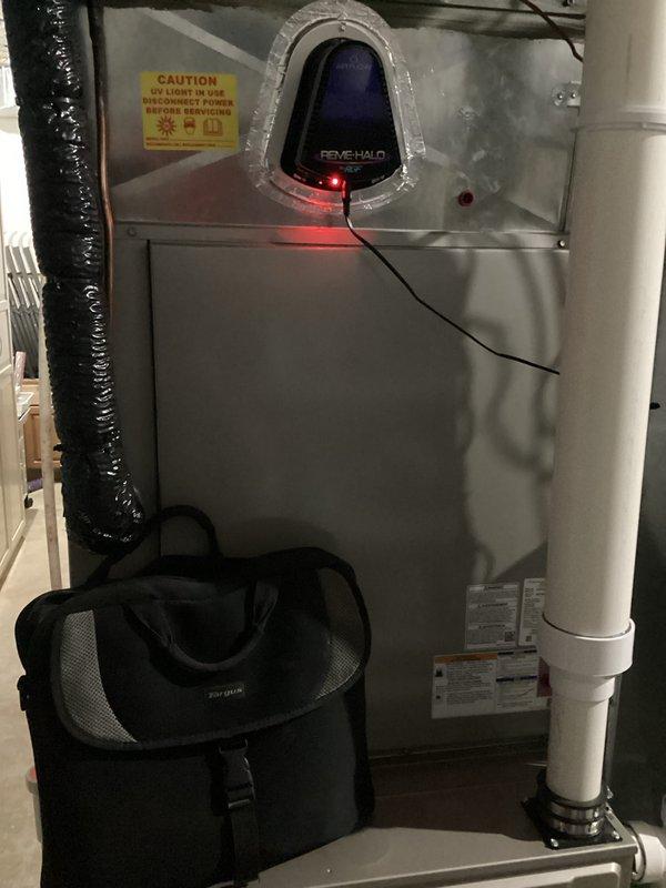 Completed full HVAC system replacement including Bryant brand air conditioning condenser unit and indoor air handler/furnace. Removed existing system that had experienced repeated failures and installed new equipment on existing concrete pad against exterior brick wall. Connected refrigerant lines, electrical disconnects, and PVC condensate drainage. Installed Resideo monitoring device on indoor unit for system diagnostics. Verified all electrical connections, tested system operation, and confirmed proper airflow through existing ductwork.