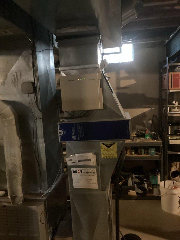 Provided comprehensive estimate for complete HVAC system replacement including a 15-year-old non-functional air conditioning unit located behind the residence and a 22-year-old furnace in the basement utility area. Assessed existing natural gas furnace with standard ductwork configuration and outdoor condensing unit, documenting current system layout and mechanical connections for proper equipment sizing and installation planning. Generated detailed replacement proposal covering both heating and cooling components to restore full climate control functionality to the residence.