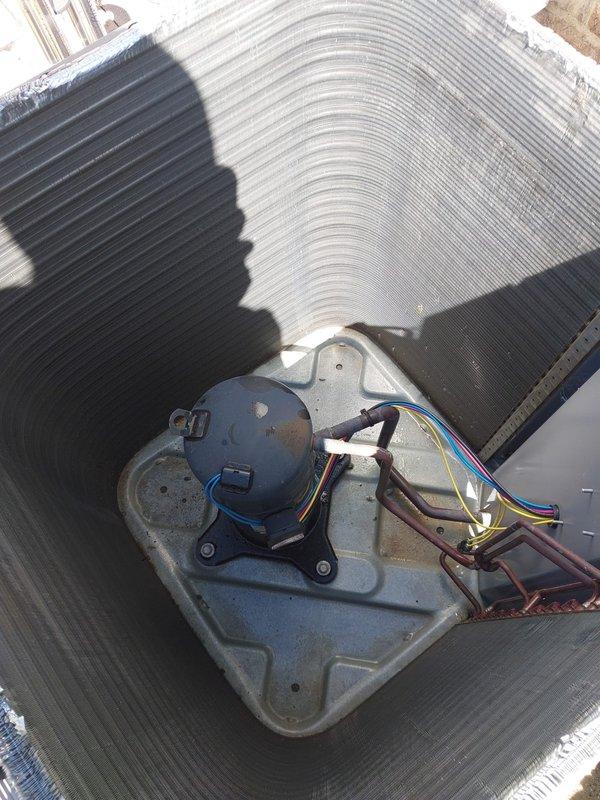 Completed preventive maintenance on residential air conditioning system. Performed comprehensive inspection of outdoor condenser unit, including examination of condenser coils, fan motor assembly, and electrical connections. Condenser coils showed moderate accumulation of dirt and debris, which is typical for seasonal operation. Verified proper fan motor operation and confirmed all wiring connections were secure and intact. Unit operating within normal parameters upon completion of maintenance service.
