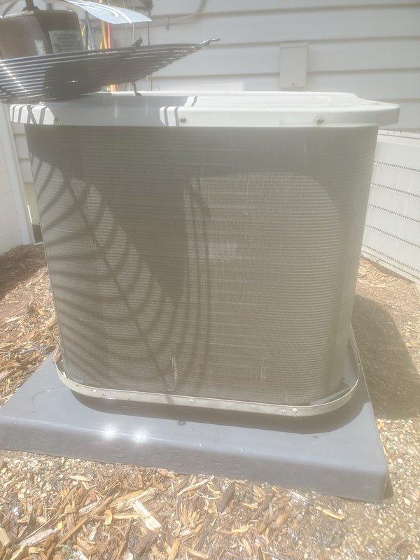 Completed annual AC maintenance inspection on residential split system. Performed visual inspection of indoor evaporator coil and air handler components, checked electrical connections and wiring, and inspected outdoor condensing unit including cabinet condition and proper placement on equipment pad. Customer advised that current maintenance plan has expired and requires renewal for future coverage.