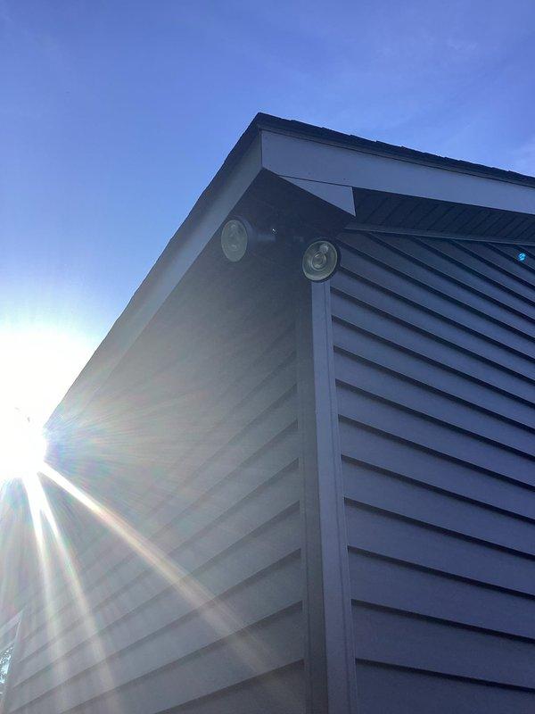Installed mechanical interlock system and 30-amp power inlet on residential electrical panel to enable safe generator connection during power outages. Installation completed on exterior wall with proper weatherproof enclosure and verified all safety mechanisms functioning correctly.