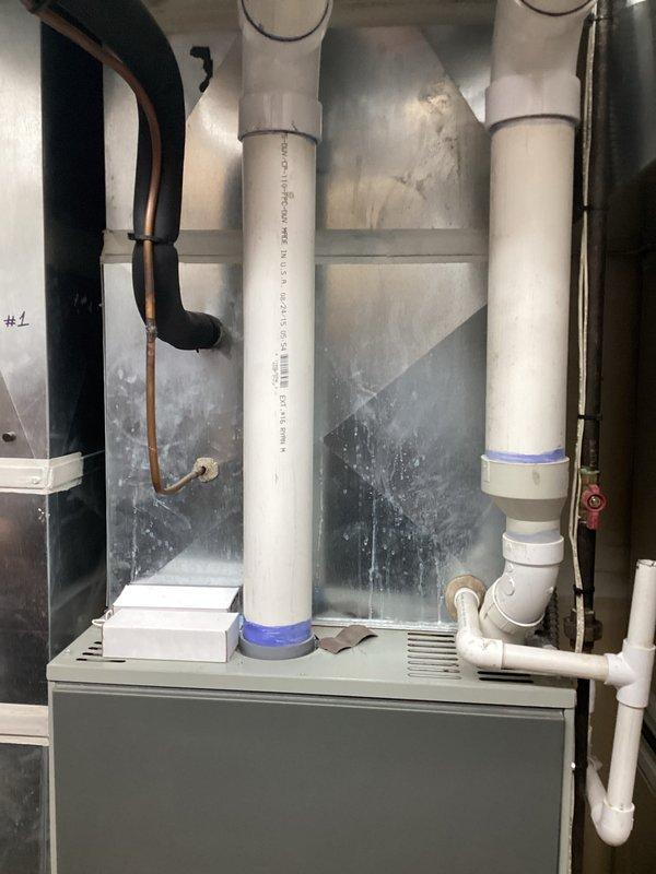 Completed comprehensive estimate for complete HVAC system replacement at residential property. Assessed existing American Standard furnace and air conditioning equipment, documenting current system specifications and installation configuration including PVC venting, condensate drainage, and ductwork connections. Provided replacement options and scheduled installation availability between 3-5 PM to accommodate customer's scheduling requirements.