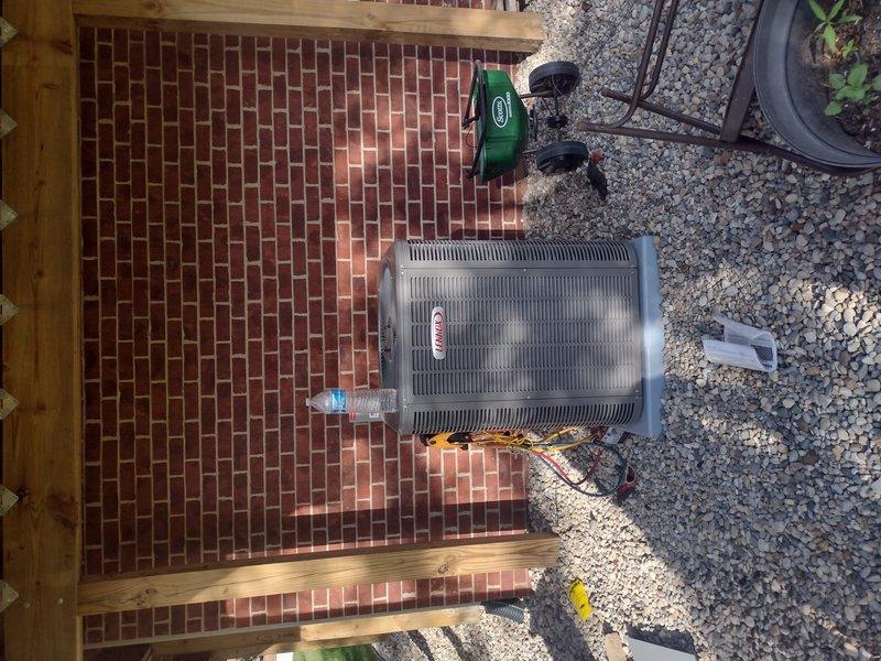 Completed full HVAC system installation including Lennox furnace, air conditioner condenser unit, whole-home humidifier, and S40 smart thermostat. The outdoor condenser unit was positioned on a dedicated brick paver pad with proper clearances and drainage, while all indoor components were installed and integrated into the existing ductwork system. System was tested, commissioned, and verified operational with all equipment communicating properly through the S40 thermostat control interface.