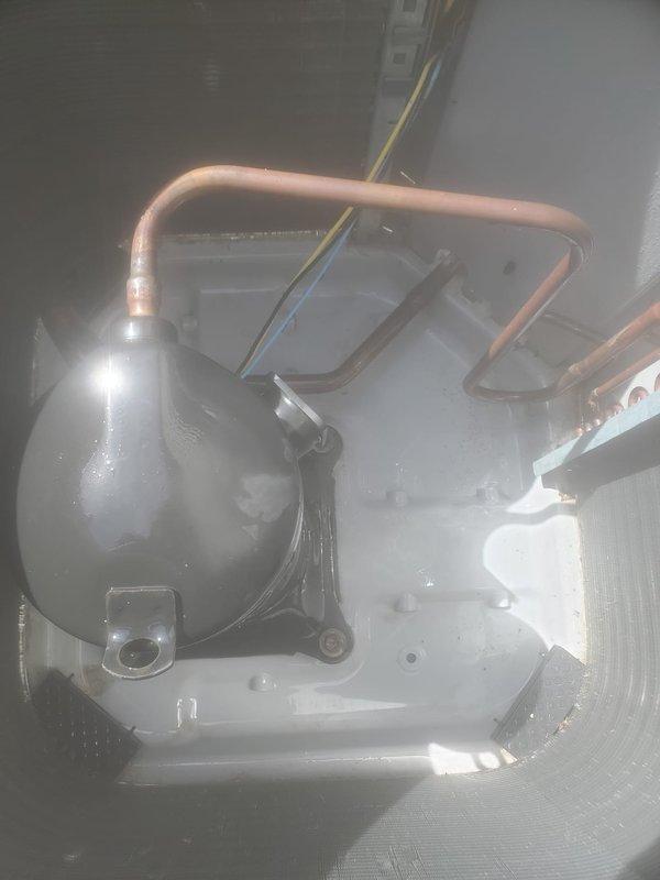 Completed comprehensive cooling system tune-up and maintenance on residential HVAC unit. System was operational upon arrival and confirmed working properly throughout service. Performed standard preventative maintenance procedures on both indoor and outdoor components, including inspection of compressor, refrigerant lines, electrical connections, and condenser unit with protective cage. All copper piping, connections, and system components inspected and found in satisfactory working condition with no issues identified.